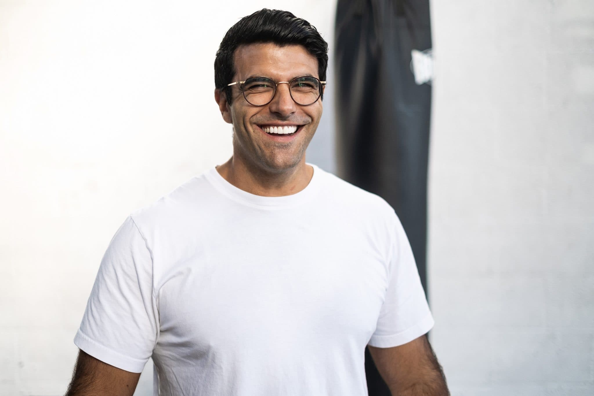 Richard Aceves laughing openly, natural light